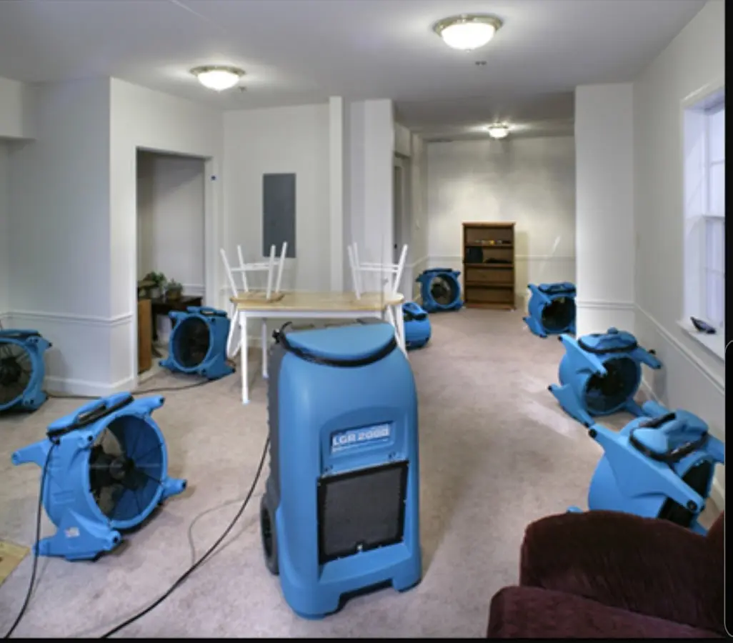 Air movers and dehumidifier setup for Water Damage Restoration in Beloit